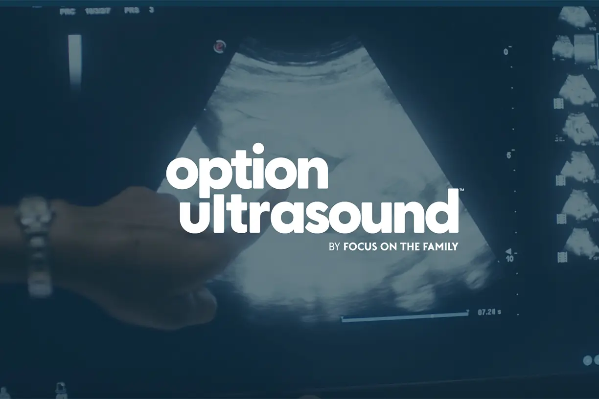 Logo for Option Ultrasound by Focus on the Family over ultrasound imagery.