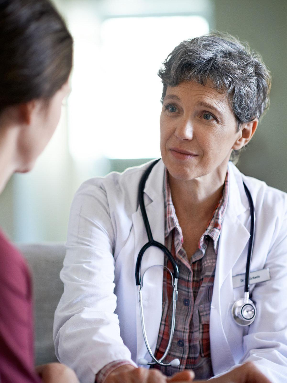 Doctor consulting patient